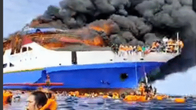 "Kapal Motor (KM) Gregorius Barcelona V mengalami kebakaran hebat saat berlayar dari Talaud menuju Manado di perairan Pulau Talise, Kecamatan Likupang Barat, Kabupaten Minahasa Utara, pada Minggu (20/07/2025)."